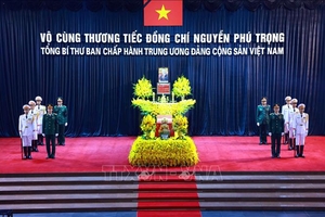 Bức tranh kính với hàng nghìn ảnh chân dung tưởng nhớ Tổng Bí thư Nguyễn Phú Trọng