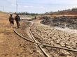 Lòng hồ Bầu Nai (xã Bầu Cạn, huyện Chư Prông) cạn khô đã nứt nẻ. Ảnh: Lê Nam