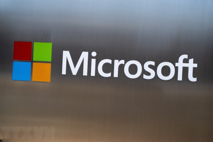 Biểu tượng Microsoft bên ngoài tòa nhà văn phòng ở Chevy Chase, Maryland, Mỹ. Ảnh: AFP/TTXVN
